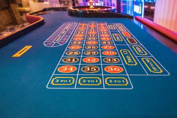 Live casino studio with multiple-camera setup and dealer